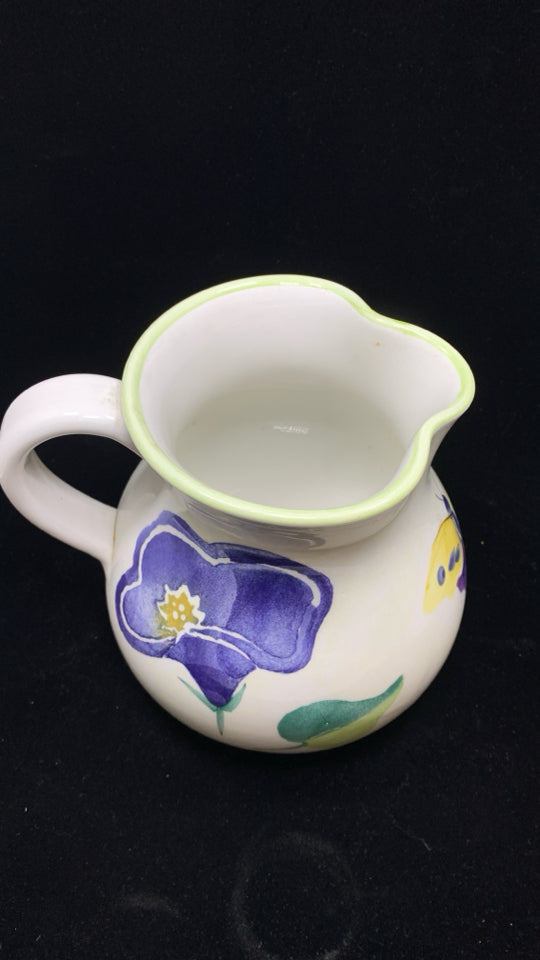 FLORAL PAINTED PITCHER W/LIME GREEN RIM.