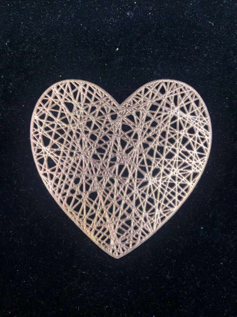 RUBBER HEART DOILY.