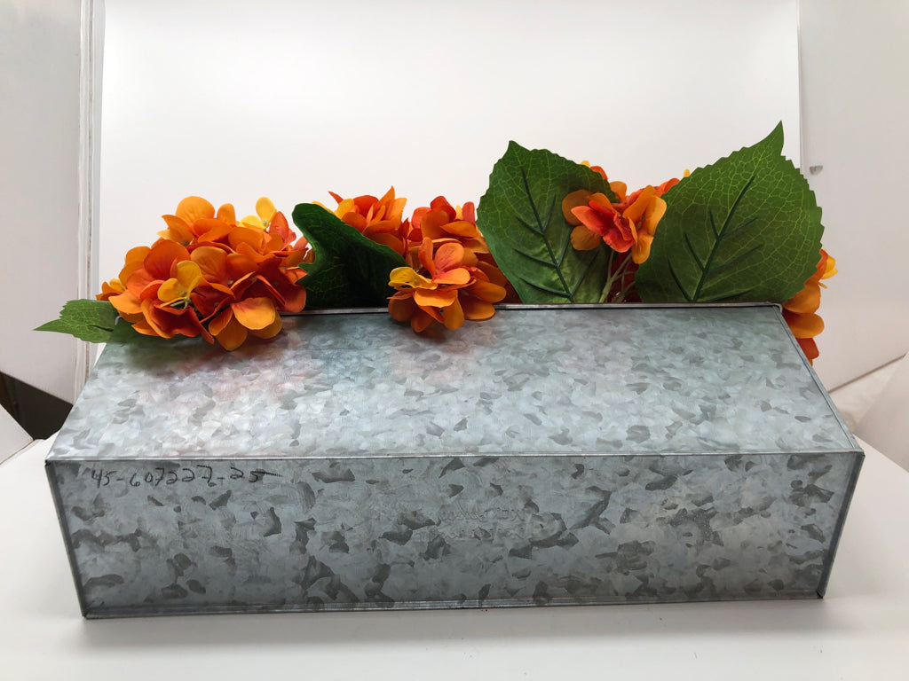 FAUX ORANGE HYDRANGEAS IN TIN PLANTER.
