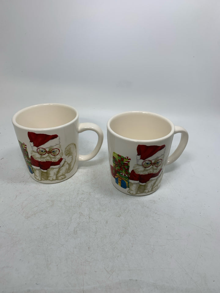 2 PIER ONE WHITE CAT W/ GLASSES IN SANTA HAT MUGS.