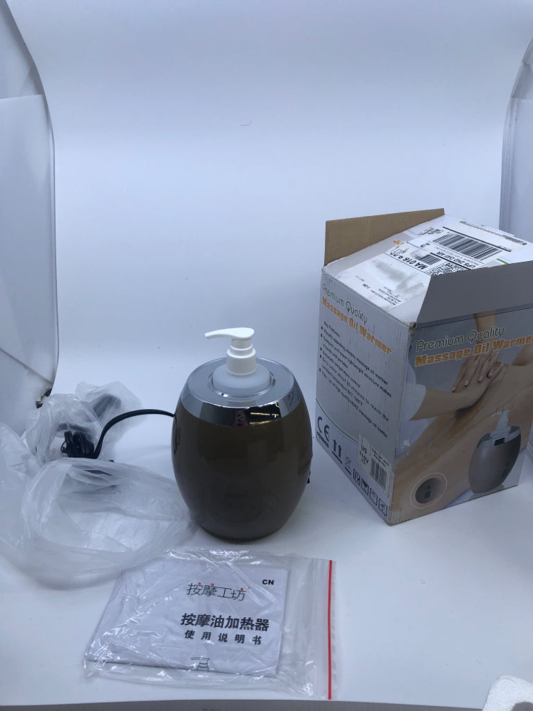 NIB MESSAGE OIL WARMER.