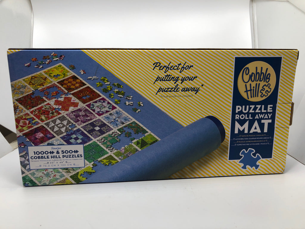 NIB PUZZLE ROLL AWAY MAT.