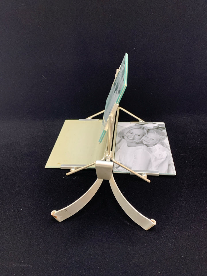 SILVER ROTATING 3 SECTION PHOTO FRAME.