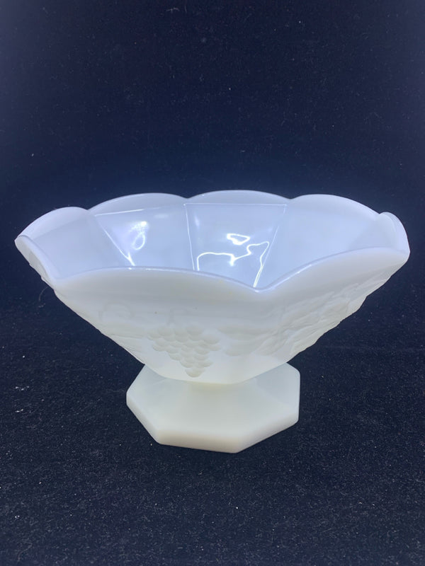 MILK GLASS FOOTED BOWL W/ EMBOSSED GRAPES SCALLOP EDGE.