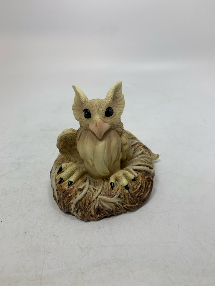 GRIFFIN W/ LONG EARS IN NEST RESIN FIGURINE.