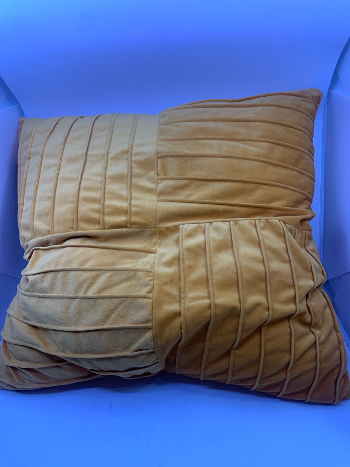 LARGE ORANGE PILLOW.