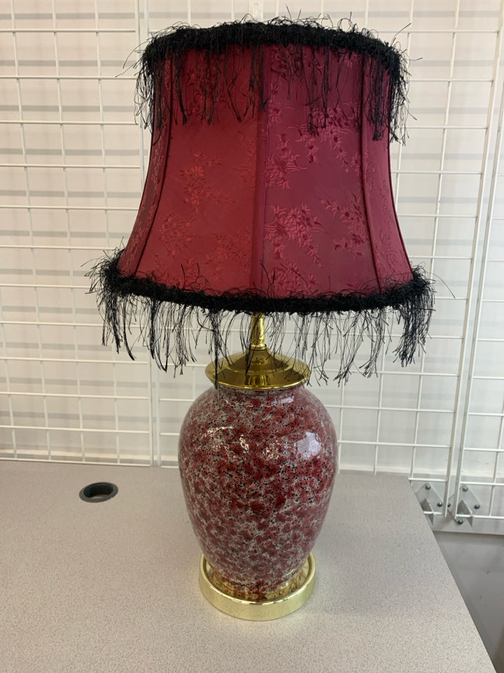 RED SPECKLED CERAMIC BASE LAMP W/RED SHADE.