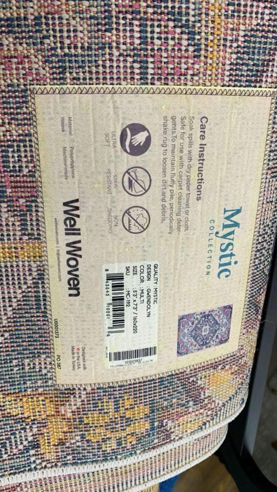 MYSTIC COLLECTION GWENDOLYN MULTI-COLORED FLORAL RUG.