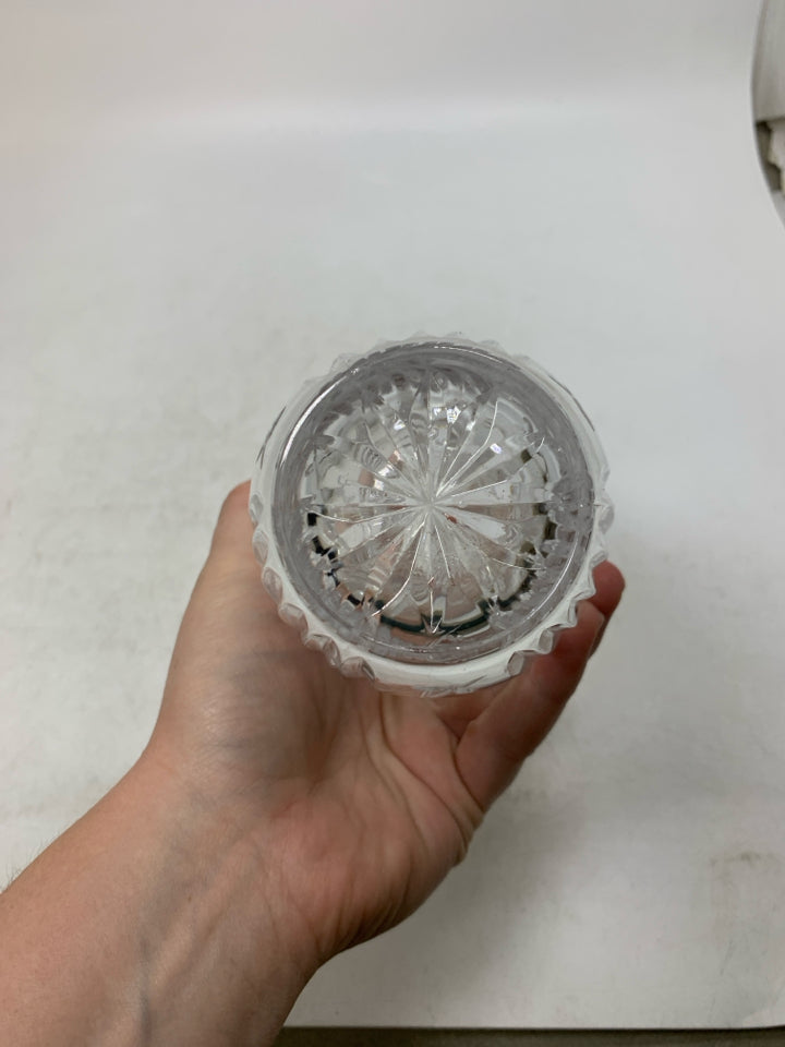 HEAVY CRYSTAL VASE W/ LINE ETCHED FLOWERS.
