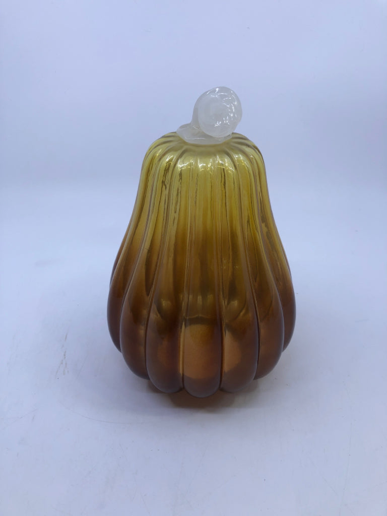 2 AMBER/YELLOW GLASS PUMPKINS W/ WHITE STEM.