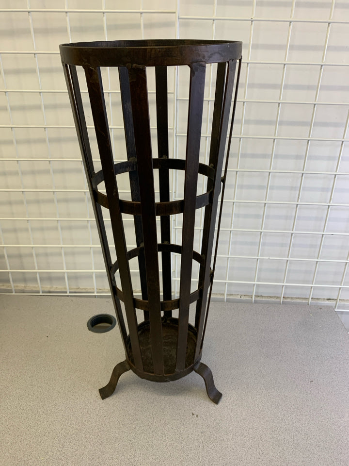 HEAVY METAL FOOTED UMBRELLA HOLDER.