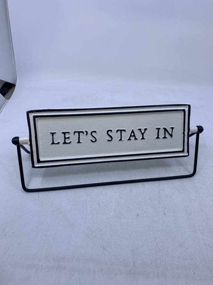 BLACK/WHITE METAL SIGN LETS GO/STAY.
