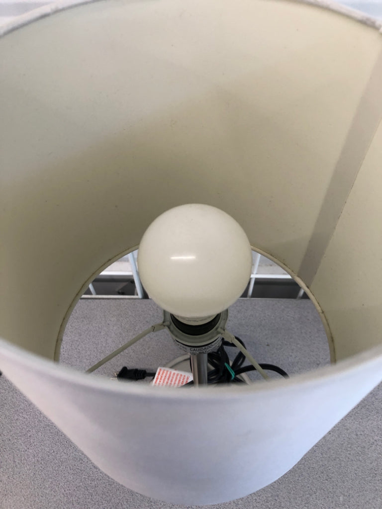 LAMP W/SILVER BASE AND WHITE SHADE.