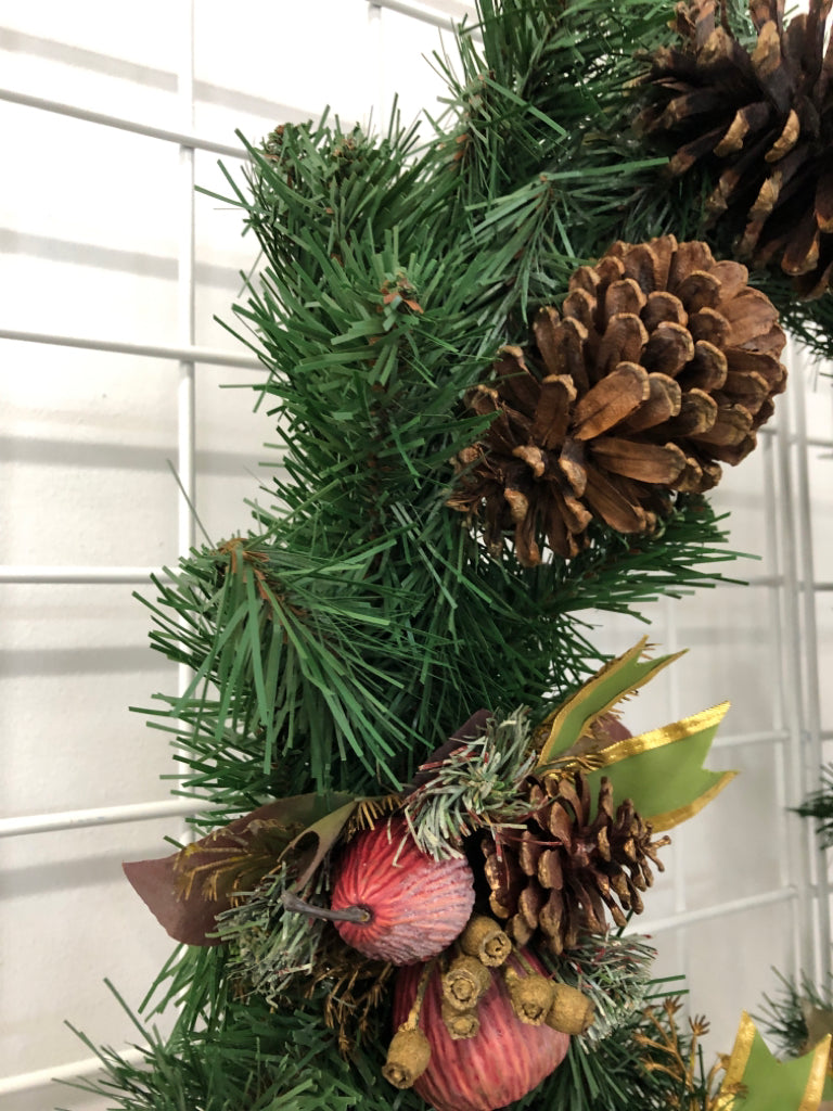 WREATH W FRUIT AND PINECONES.