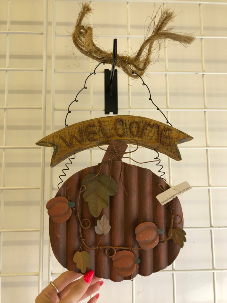 PRIMITIVE METAL PUMPKIN WELCOME SIGN.