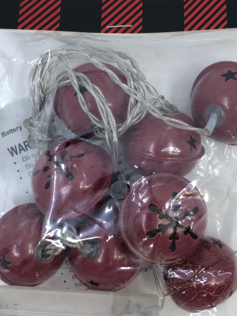 NIP RED LIGHTED JINGLE BELLS.