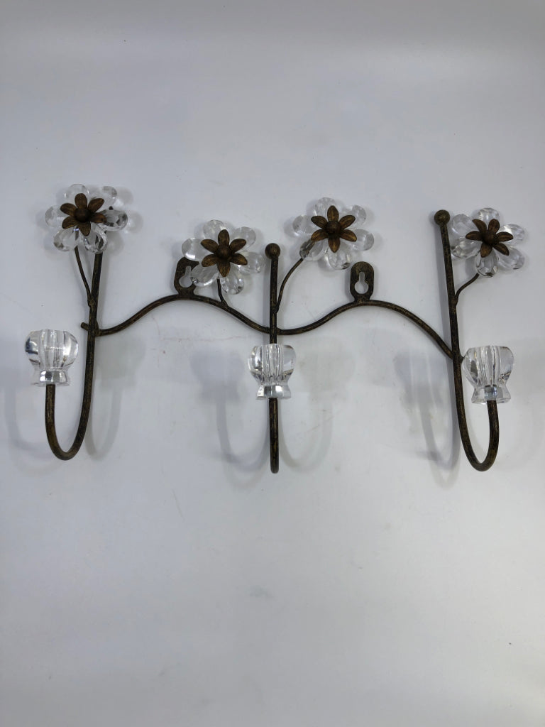 BROWN METAL CLEAR PLASTIC FLOWER WALL HOOKS.