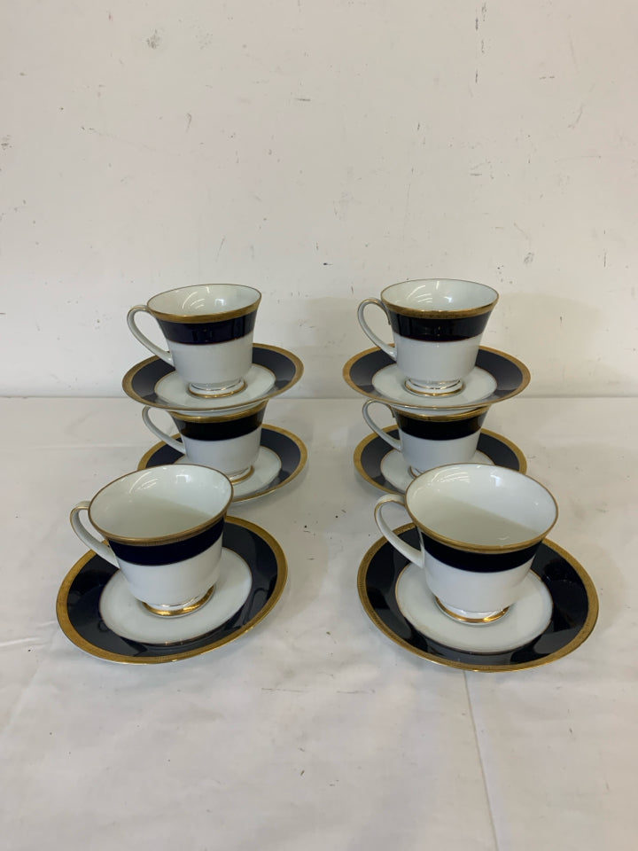 12 PC LEGACY VALHALLA NAVY AND GOLD TEACUPS AND SAUCER.