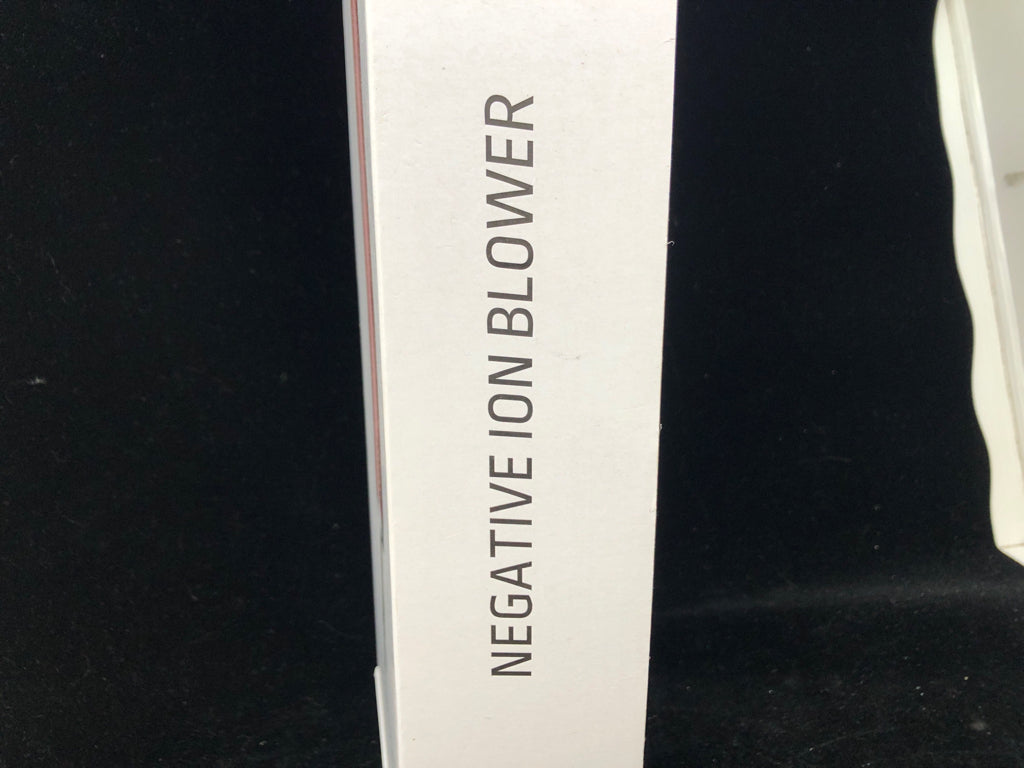 NIB PINK FOLDING HAIR DRYER.