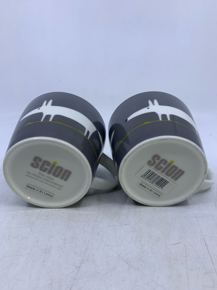 2 GREY SHORT MUGS W/ LIGHT DIGS SCION.
