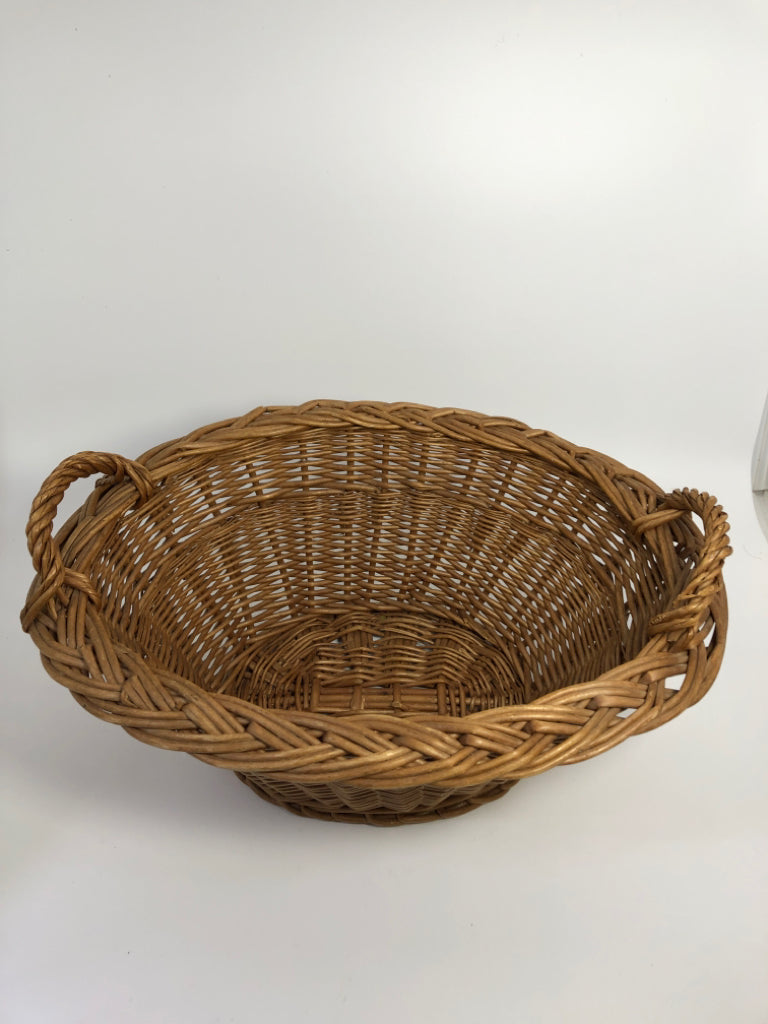 BROWN WICKER BASKET W/HANDLES.