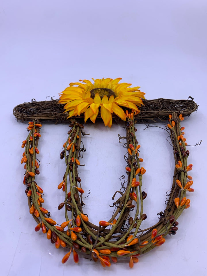 TWIG ACORN WITH SUNFLOWER WALL HANGING.