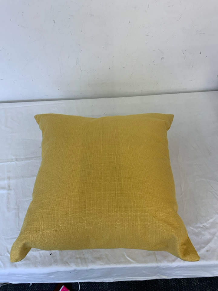 MUSTARD YELLOW PILLOW W/ BUTTON.