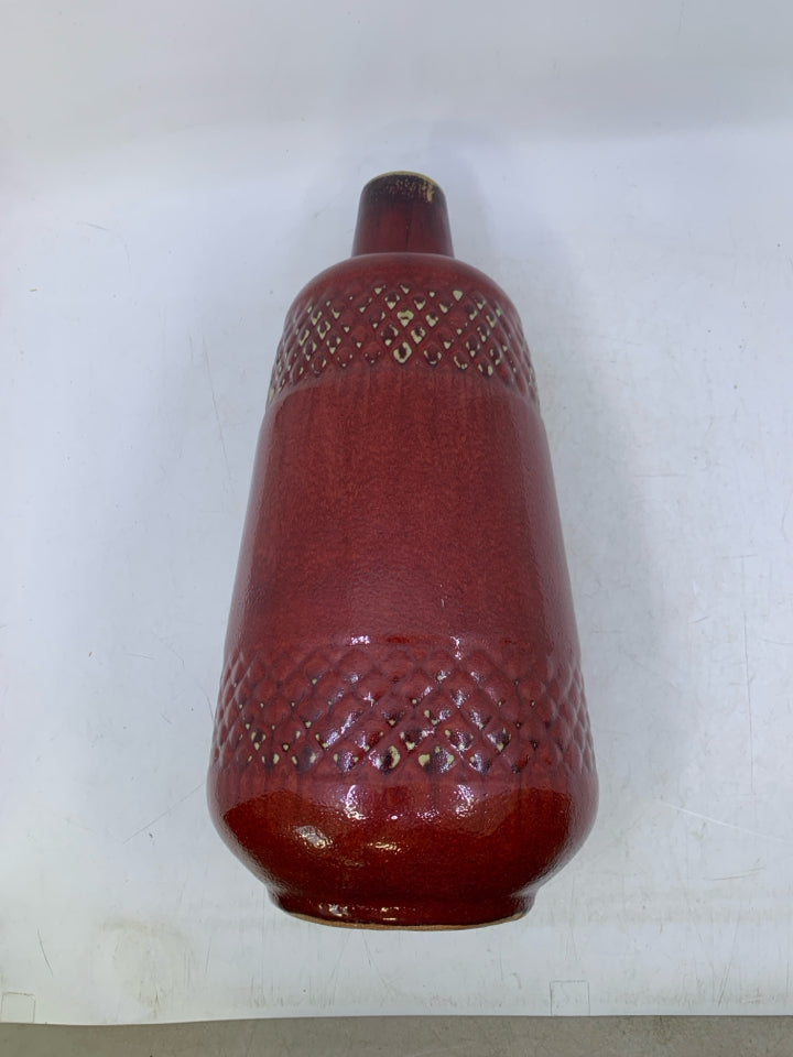 HEAVY DARK RED VASE W/ EMBOSSED DIAMOND PATTERN.