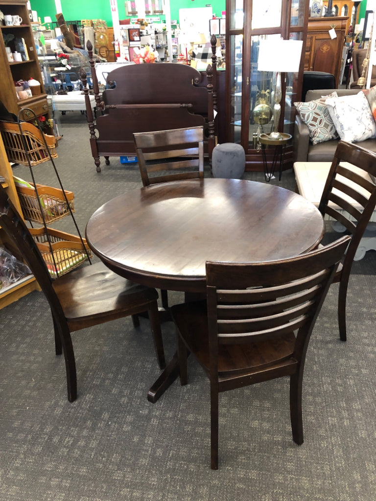 DRK WOOD ROUND TABLE W/4 CHAIRS.