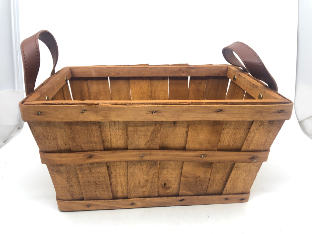 WOOD RECTANGLE BASKET W FAUX LEATHER HANDLES.