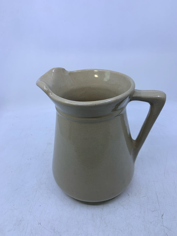 TAN POTTERY JACK DANIELS PITCHER.