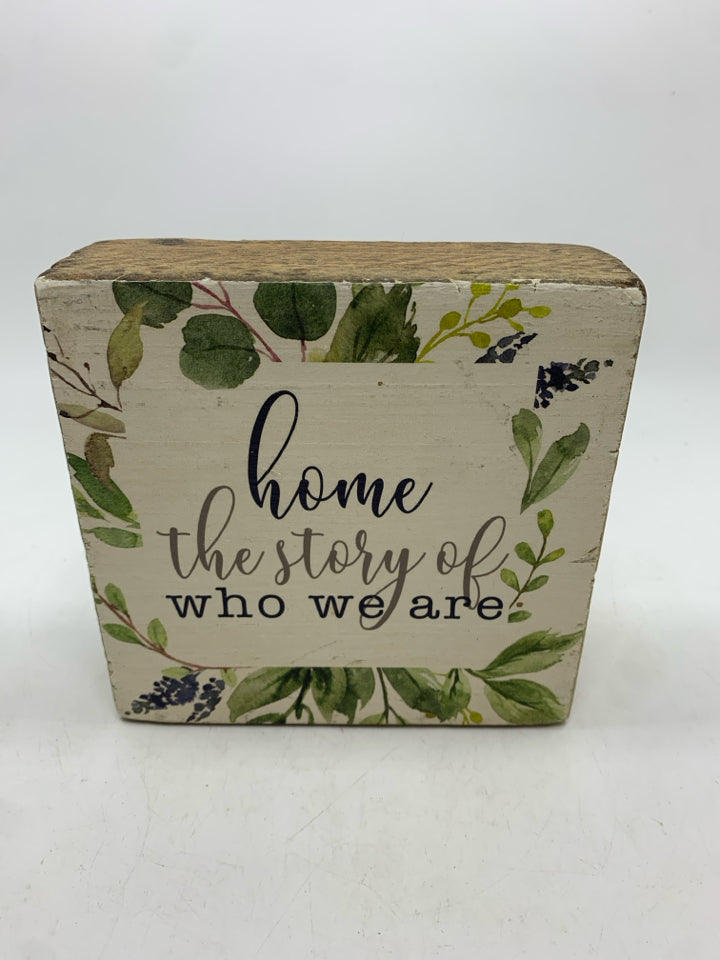 THE STORY OF WHO WE ARE LEAF PRINT BLOCK SIGN.