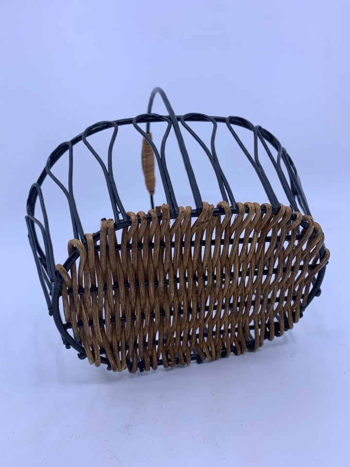 BLACK METAL BASKET W WOVEN BOTTOM AND HANDLE.