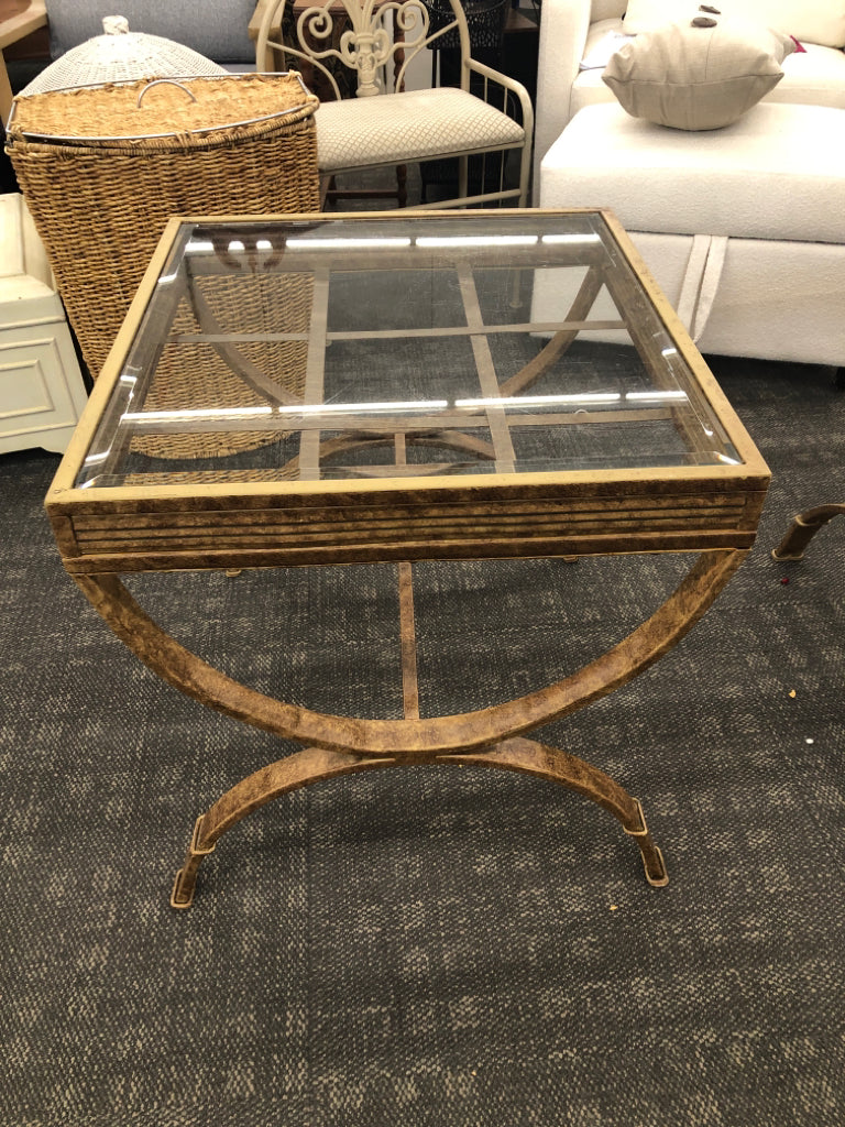 GOLD DISTRESSED SIDE TABLE W/GLASS TOP.