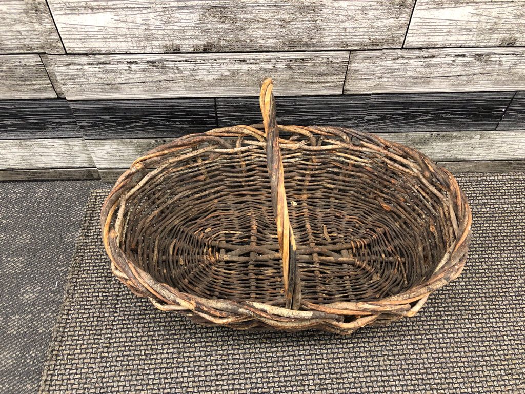 DARK TWIG WOVEN BASKET.