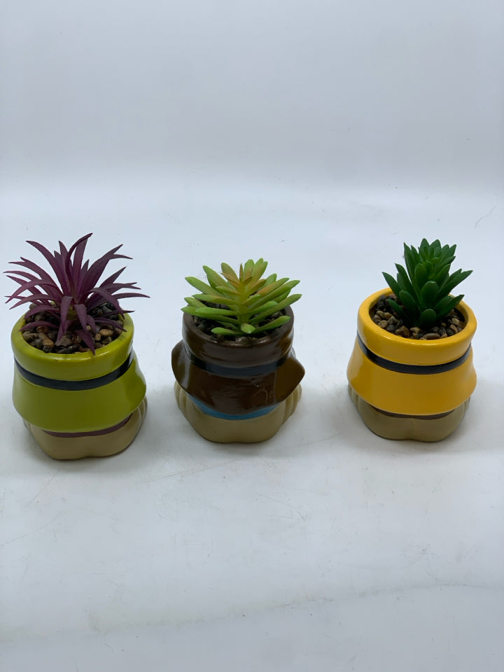 3 FAUX SUCCULENTS IN RESIN 7 DWARFS PLANTERS.