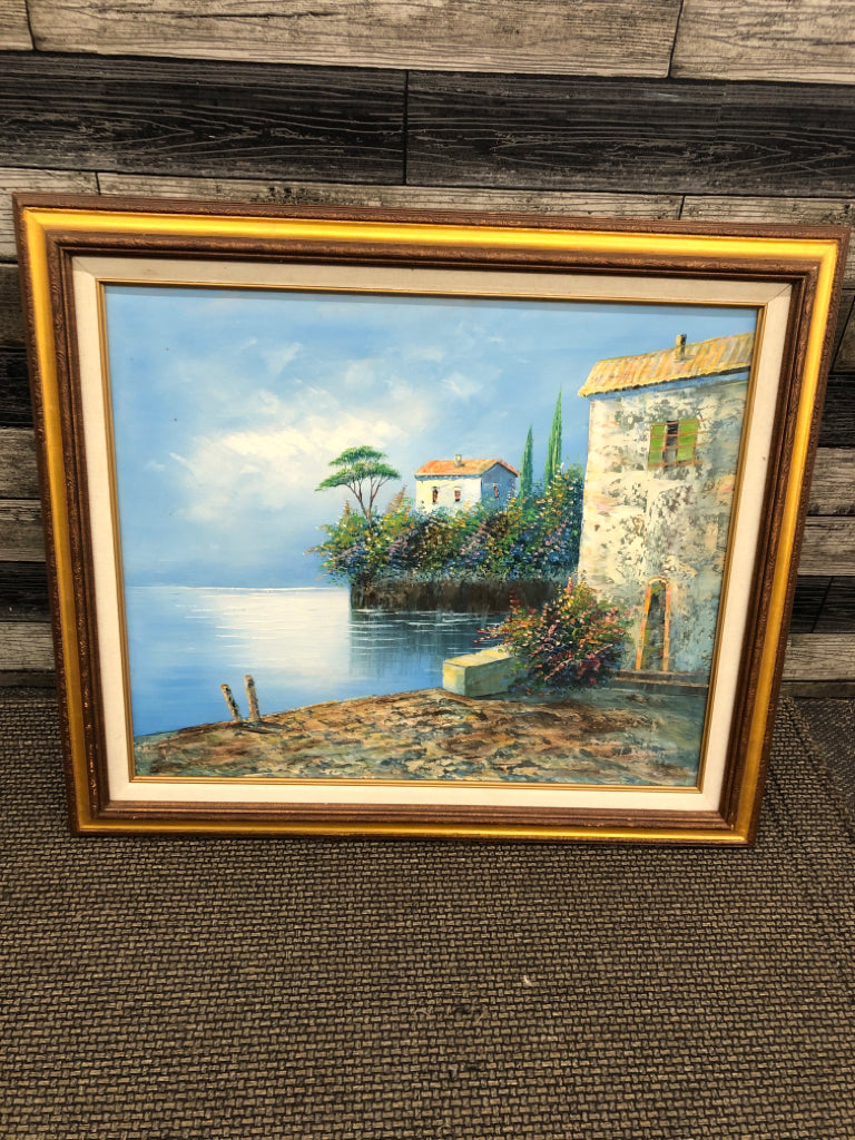SEASIDE VILLA FRAMED PAINTING.
