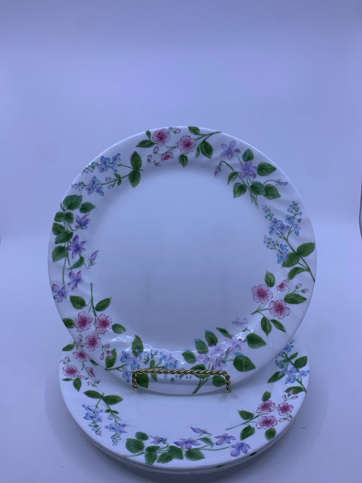 4 CORELLE DINNER PLATES W/ PINK,BLUE,PURPLE FLOWERS.