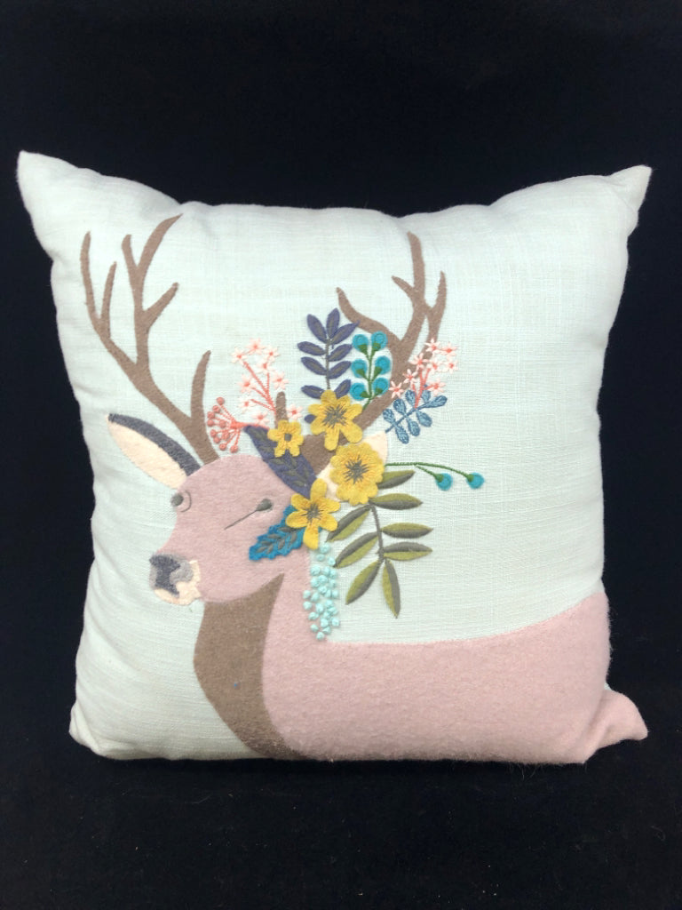PASTEL GREEN REINDEER ACCENT PILLOW.