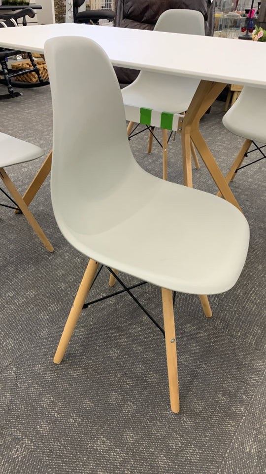 4 CHAIRS + WOOD TABLE W/ANGLED WOOD LEGS.
