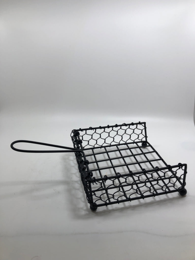 BLACK METAL NAPKIN HOLDER.