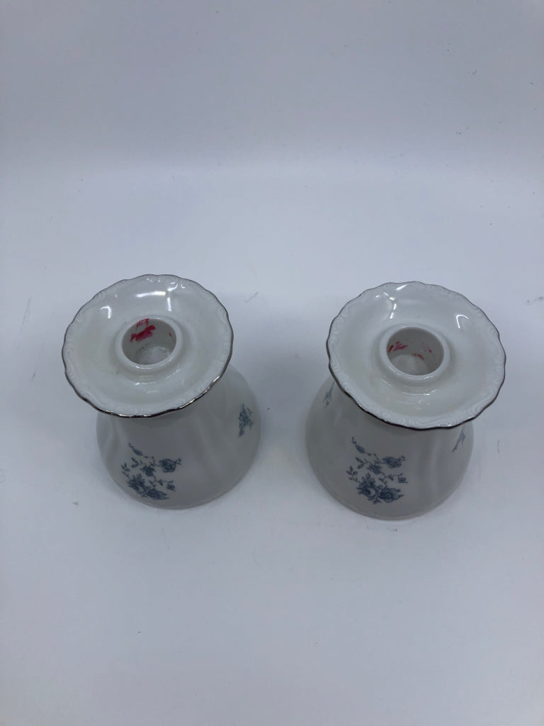 2 VTG WHITE TAPER CANDLE HOLDERS W LIGHT BLUE FLORAL.