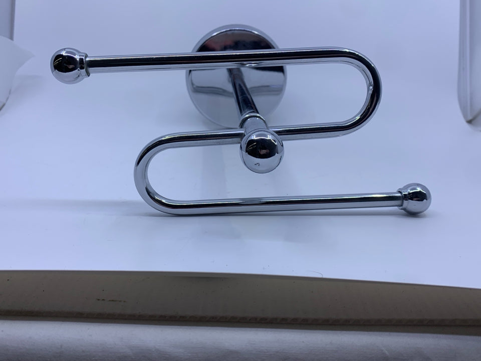 SILVER METAL TOWEL COUNTER TOP HOLDER.