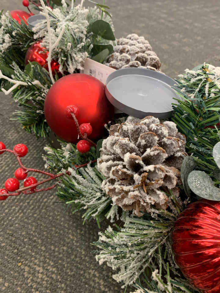 WOODEN BOX CANDLE HOLDER W/ WINTER FOLIAGE AND RED ORNAMENTS.