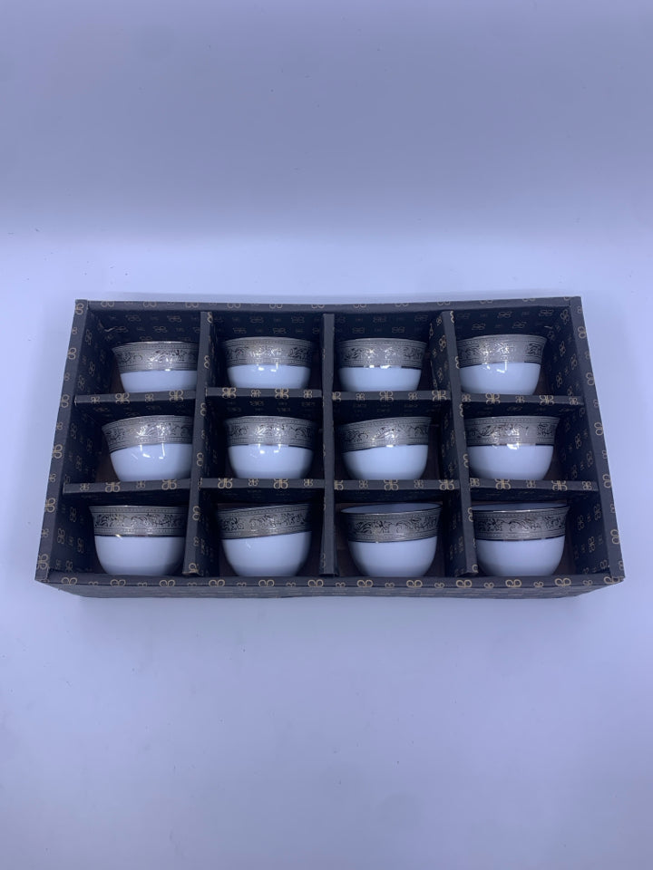 12 SAKE CUPS SILVER TRIM.