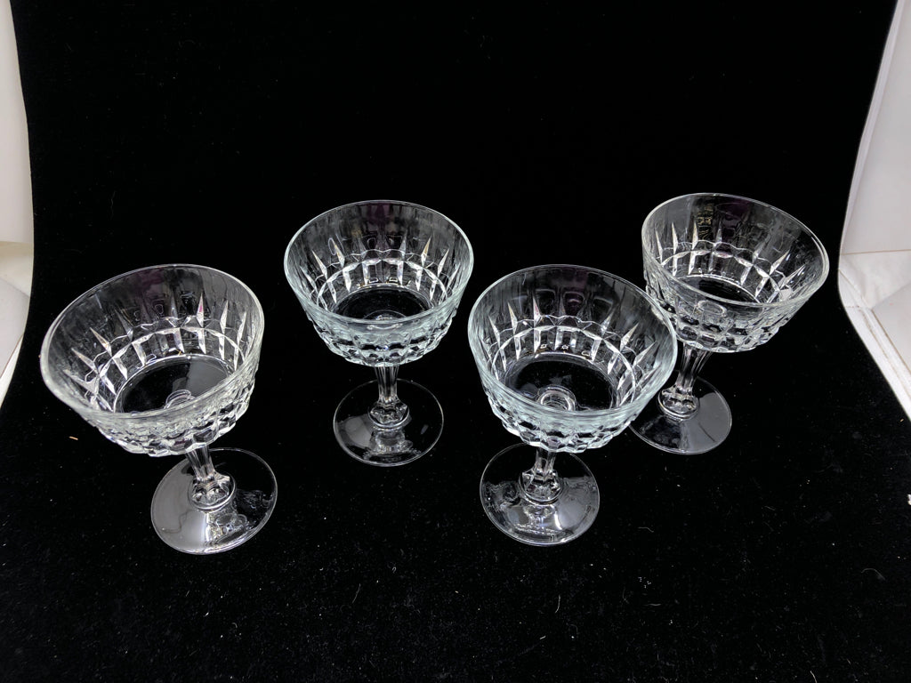 4 CRYSTAL WINE COUPE GLASSES.