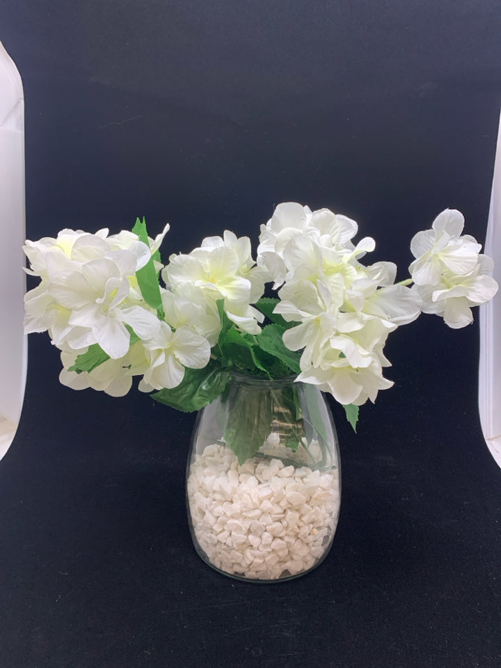 WHITE FLORAL IN ROCKS VASE.