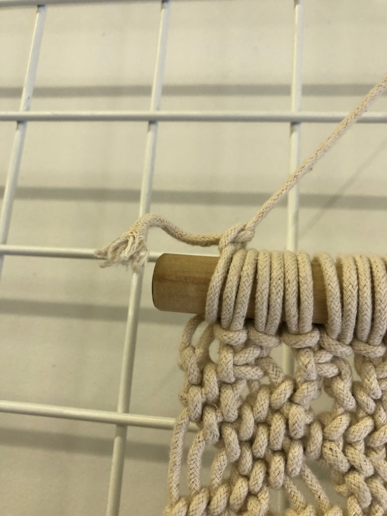 MACRAME DIAMOND PATTERN WALL DECOR.