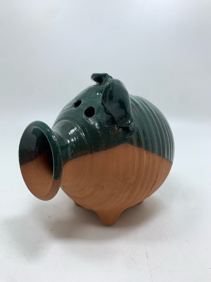 TERRA COTTA PIGGY BANK W/GREEN GLAZE.