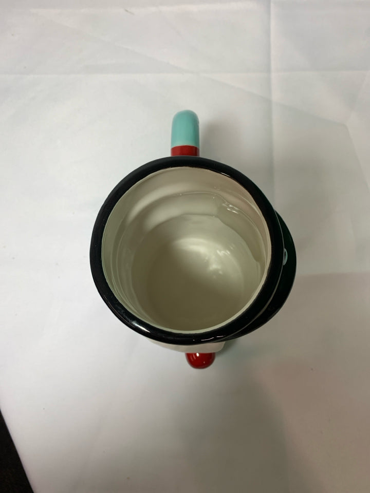 BLUE NUTCRACKER MUG.